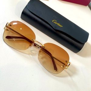 Cartier’s sunglasses 700 OBO